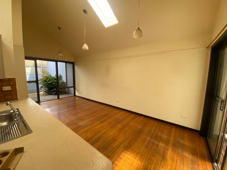 The living room of a house before renovating in Brunswick Melbourne