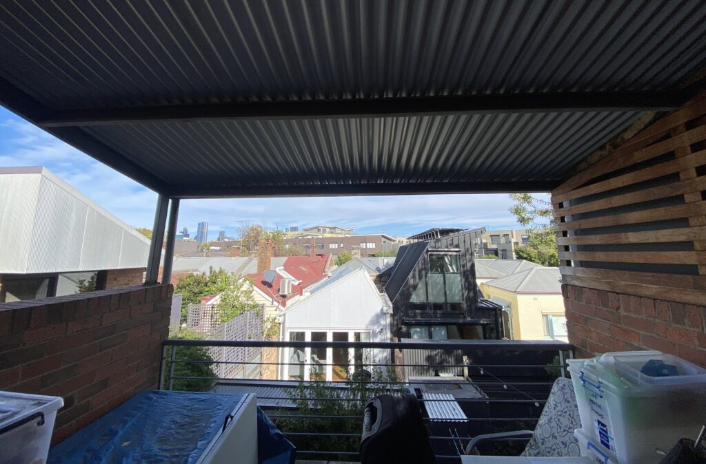 upper level balcony storage space in Fotzroy with views of Melbourne city skyline